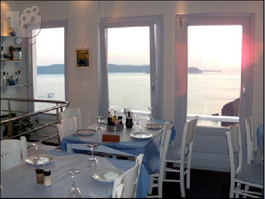 Terrace with views of the sunset Tavern Mamathira Santorini